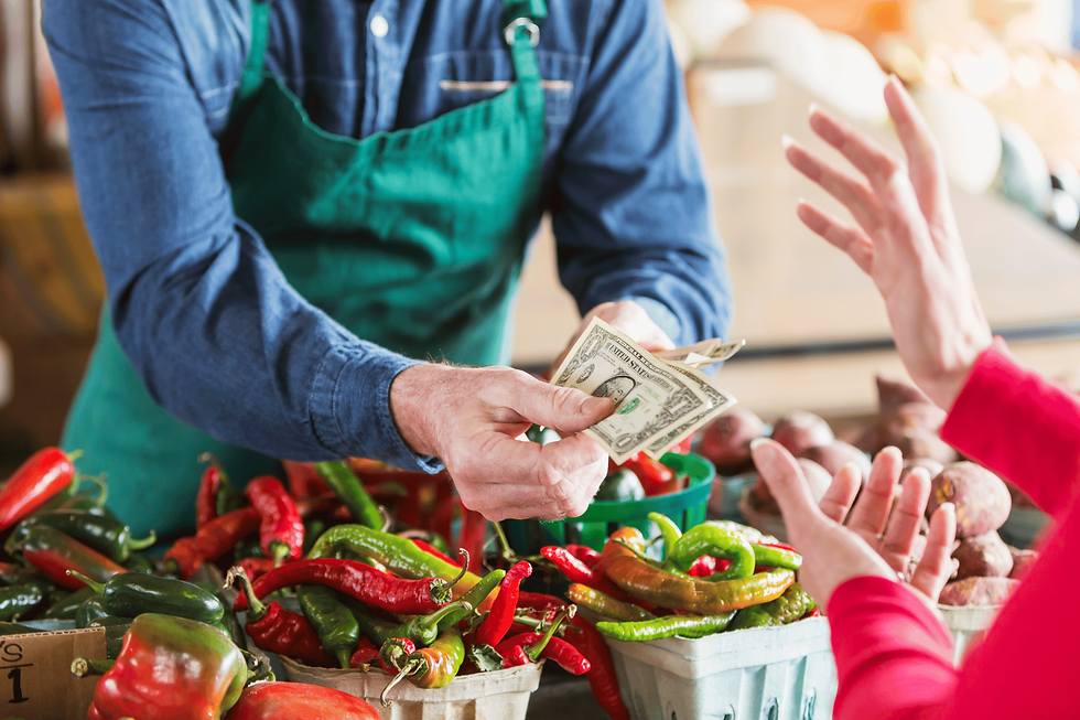 produce stand, dollar bills, hot peppers, farmers market