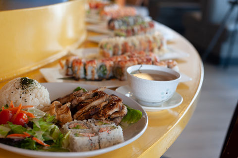 Serve with house green salad, white rice, 4 pieces California roll, 2 pieces pork gyoza, and miso soup.