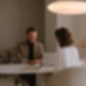 u7757675229_a_guy_talking_to_a_woman_client_on_a_zoom_in_a_na_bbe3ecd8-5d4c-4ae8-85a0-d90f