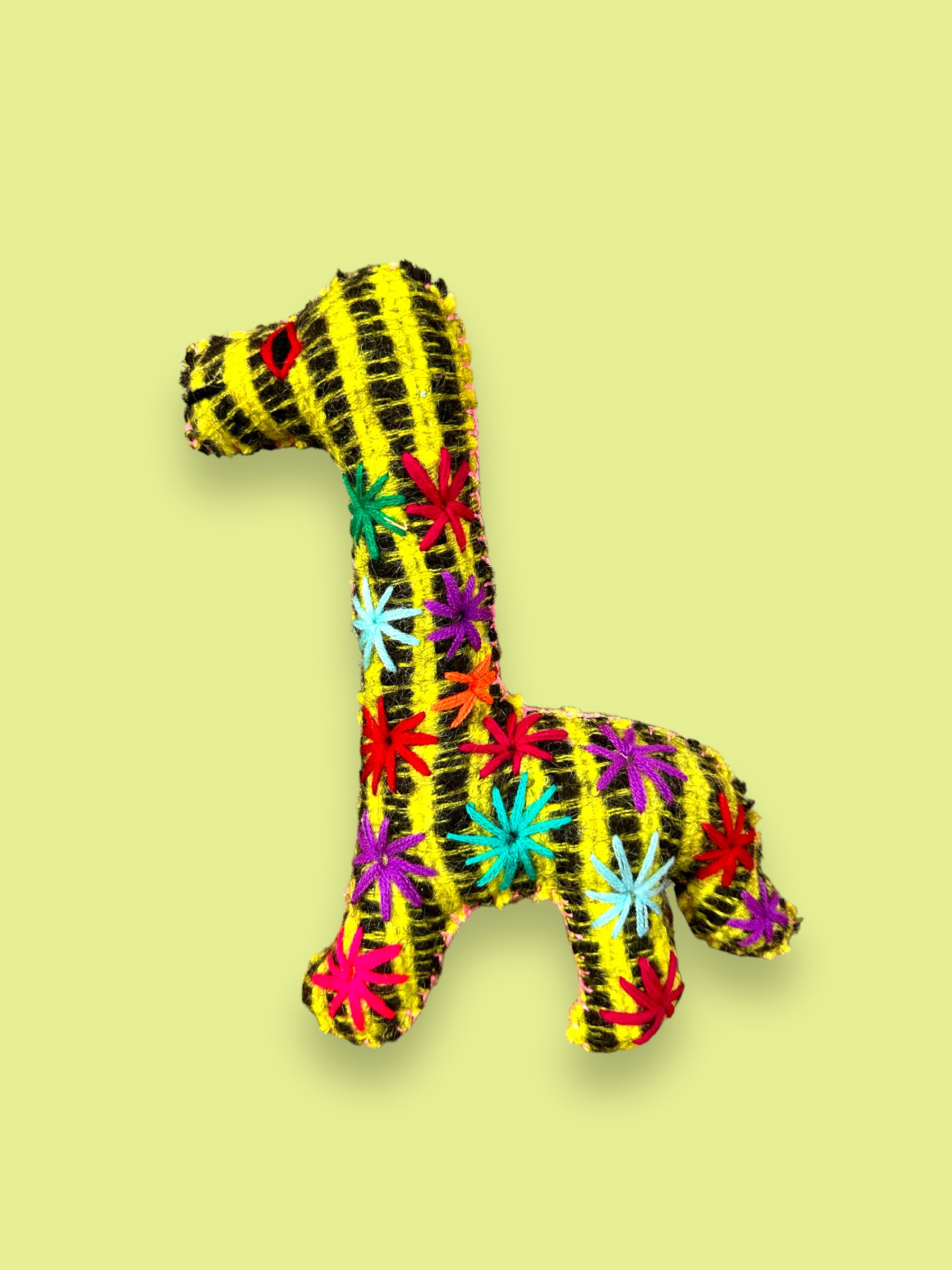Handgemachter Dinosaurier aus Wolle