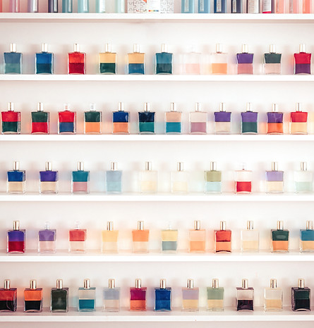 Group of color glass cosmetic bottles.jpg