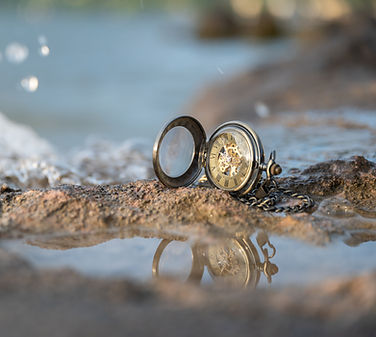 pocket-watch-on-the-beach-near-ocean-water-2026-01-07-07-32-54-utc_edited.jpg