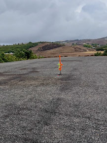 An orange small toy rocket