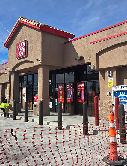 Commercial Bollards & Safety Installations  traffic-control safety bollards for vehicle flow, pedestiran walkways example around a fire hydrant, loading areas and ADA access in the Las Vegas area via VIP Concrete, front of the storefront of convenience store
