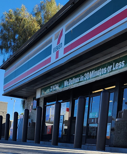 7-Eleven, Seven Eleven. Las Vegas bollard install Commercial Bollards & Safety Installations  storefront and high security bollards in process on site for vehicle roll-through, delivery, parking lot and smash-and-grab break ins/impacts and accidents, in the Las Vegas area via VIP Concrete front example
