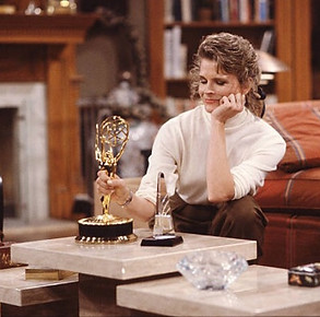 The Whinner is Murphy Brown Season two Episode eight Candice Bergen pictures with an Emmy