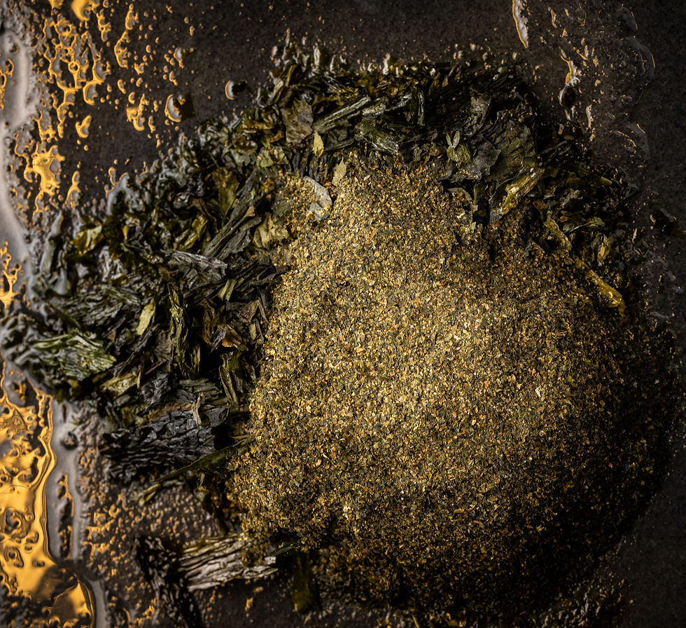 Close-up view of dried seaweed sheets arranged on a wooden surface