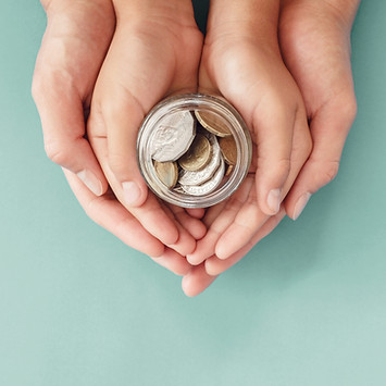 child-parent-hands-holding-money-jar-donation-saving-family-finance-plan-concept.jpg