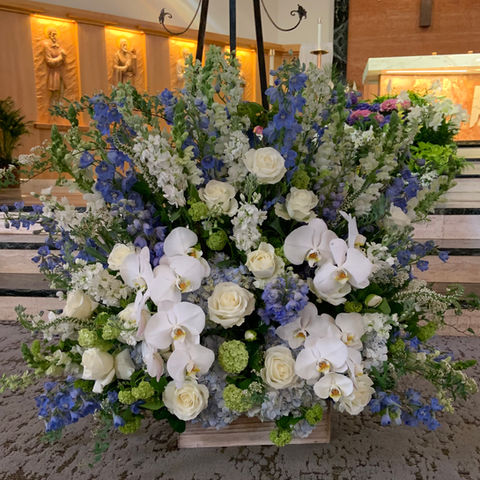 Funeral service white flower floor spray