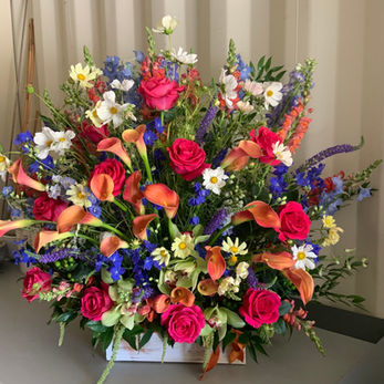 Funeral service sunset bright flower floor spray