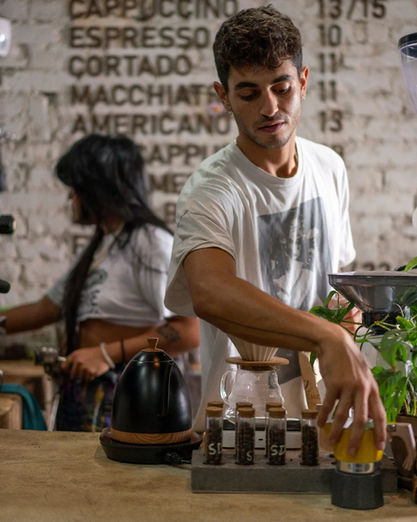 chachos cafe making coffee TLV.webp