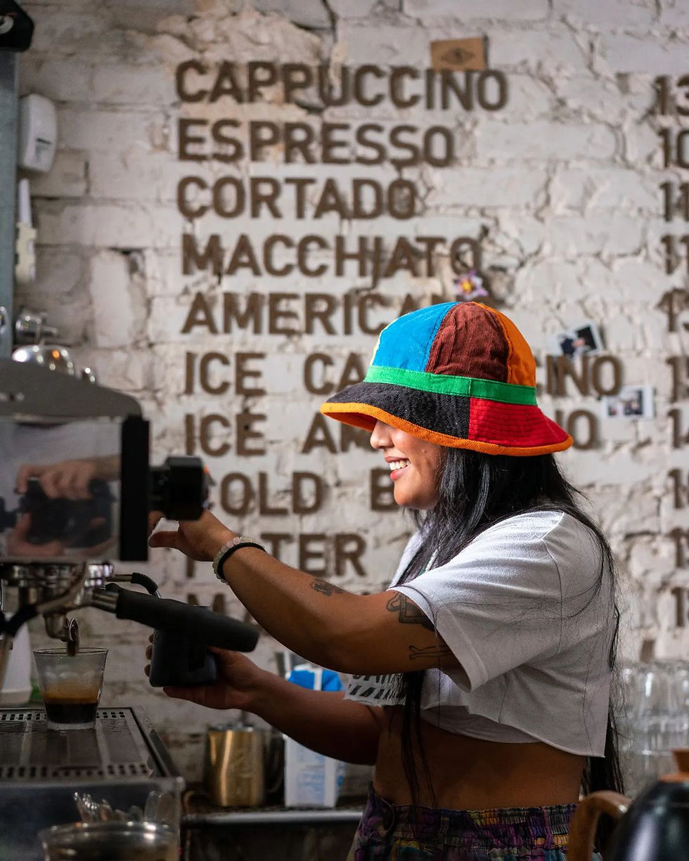 barista working on a coffee machine