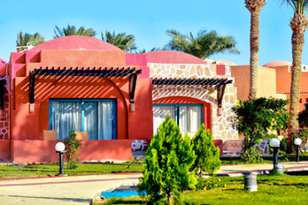 Bright resort with colorful buildings and palm trees for a relaxing vacation