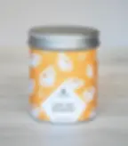 Bougie parfumée Love You Beaucoup motif fleurs fond jaune