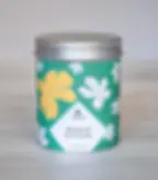 Bougie parfumée "Bonheur en vert" fond vert
