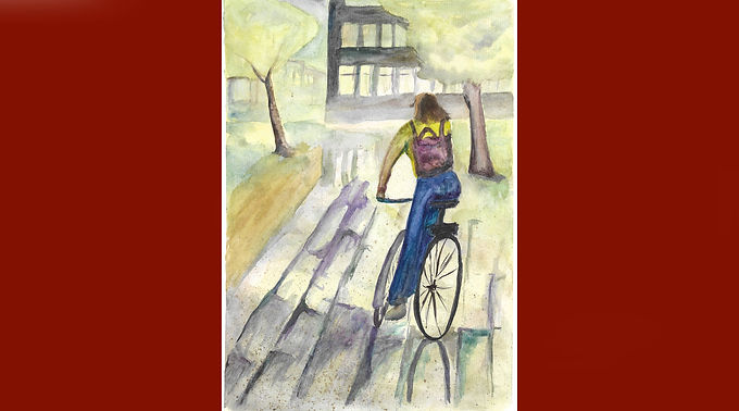 Radfahrerin im Regen