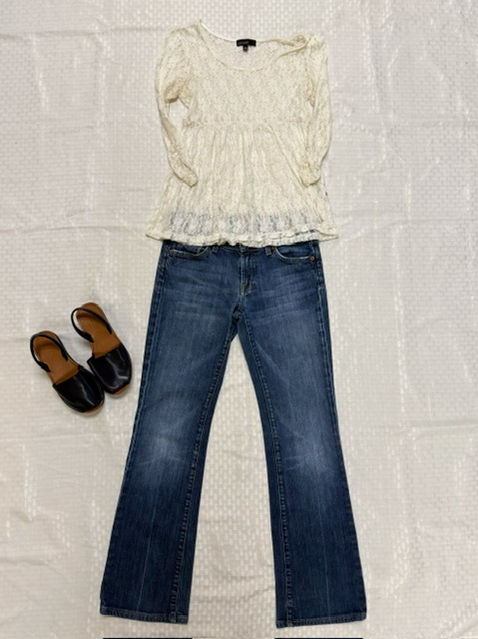 Women's ivory lace top and jeans