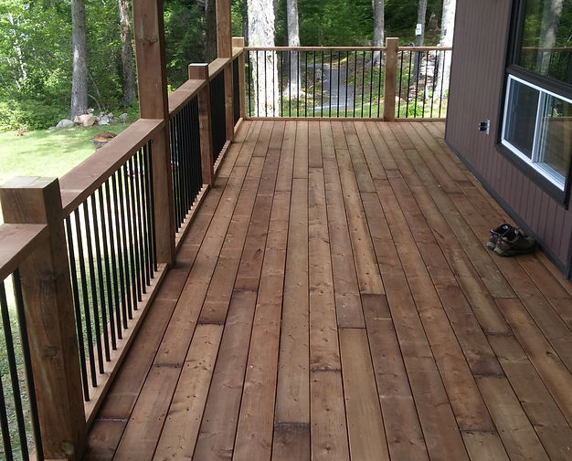 Deck with Back Spindles and Brown treated lumber