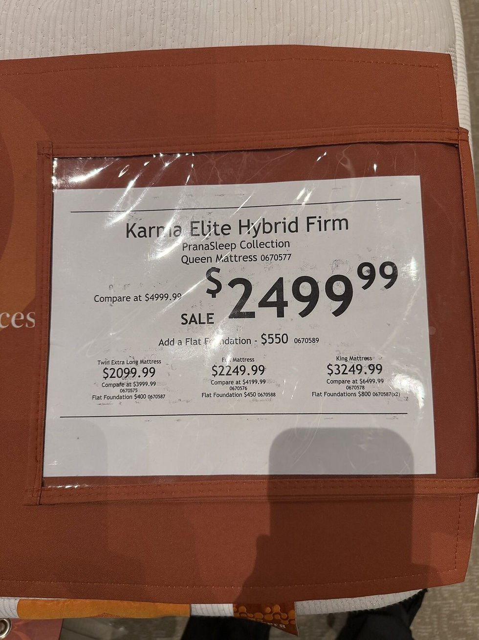 PranaSleep Karma Elite Hybrid Firm model, construction, or pricing card photographed in store during Professor Goodsleep's testing visit.