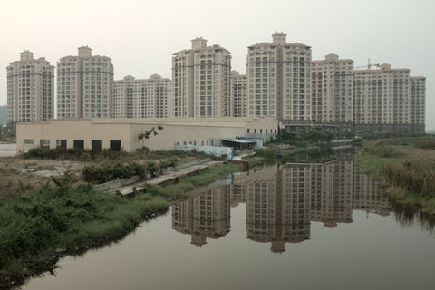 A view of the residential buildings inside the That Luang Lake SEZ. Vientiane Capital, Laos. April 2020.