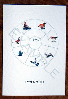 Bespoke personalised shoot card with a bird wheel, totals and peg numbers
