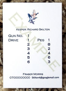 Bespoke personalised shoot cards showing drive and peg numbers along with pheasant duck and partridge