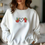 Thumbnail: "Peace, Love, Black History” Crew Sweater