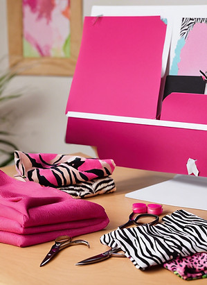 Photo of a desk with bold fabrics like z