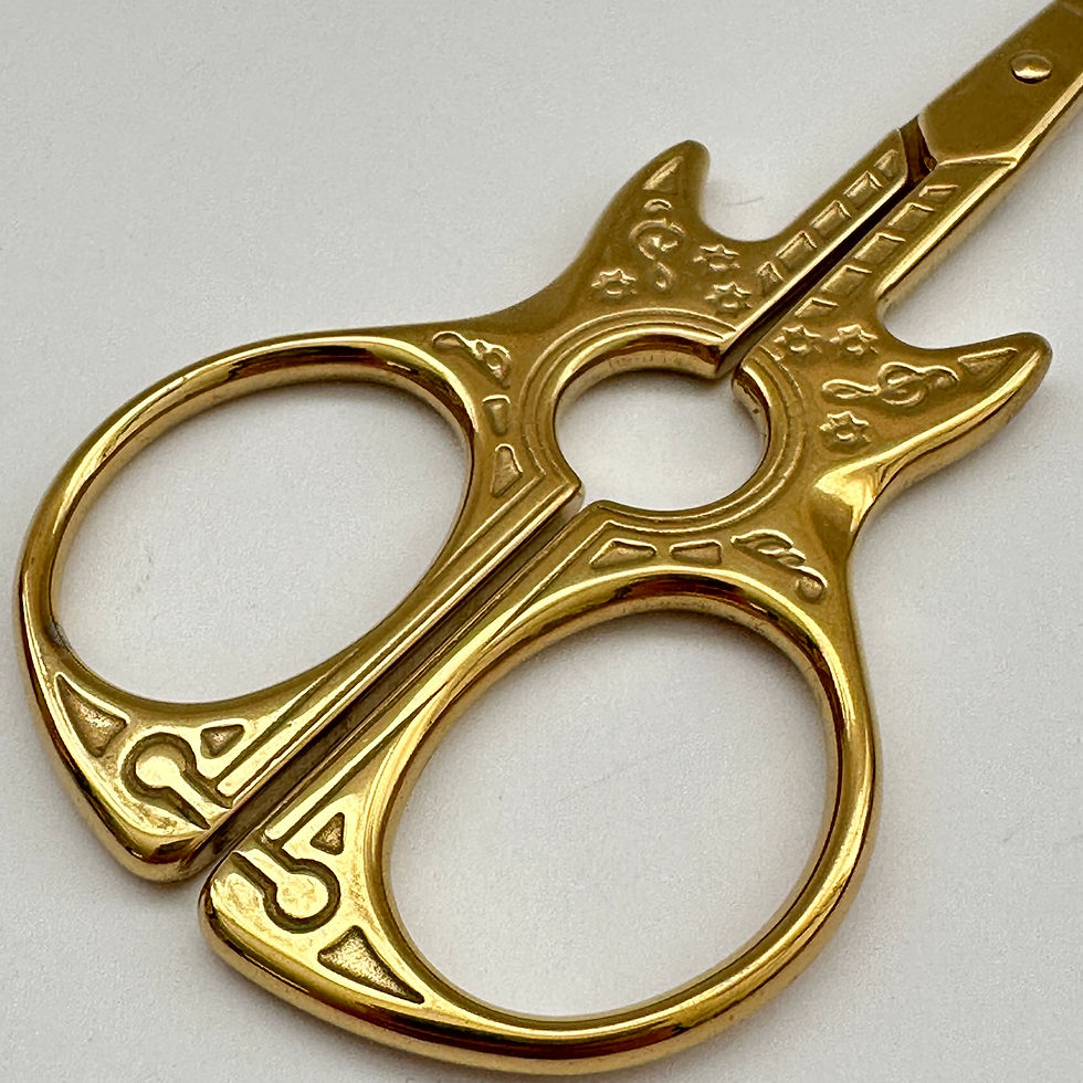 Miniatura: Tisora Guitarra