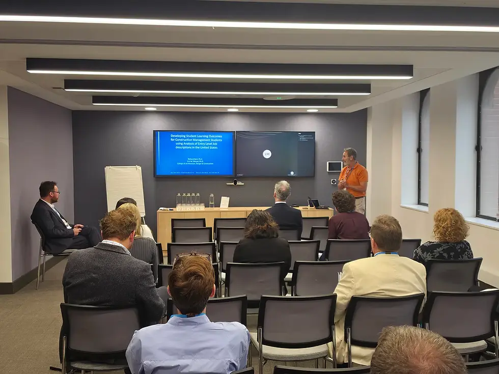 Attendees listening to a presentation during an education workshop at the RICS conference.