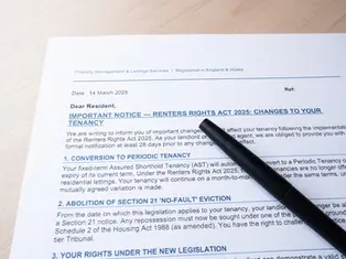 A close-up view of an official paper document titled "IMPORTANT NOTICE — RENTERS RIGHTS ACT 2025: CHANGES TO YOUR TENANCY," with a black pen resting across the text.