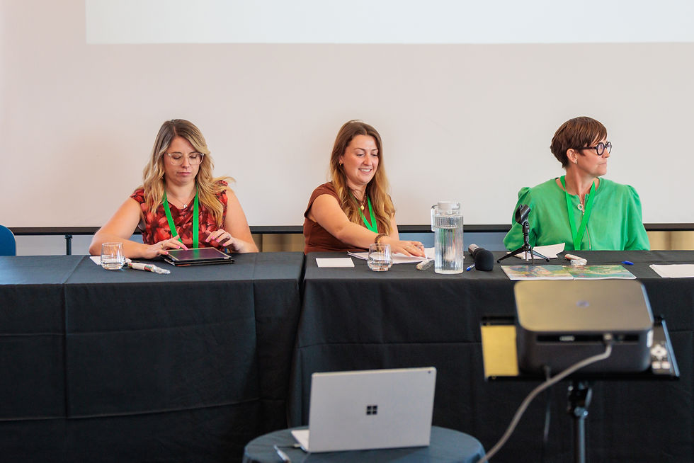 Three panel members seated at a conference table for the future workforce recruitment session.