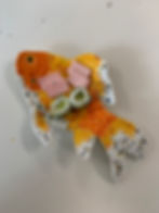 A fish plate with hand sculpted sushi