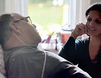 Aditi bedside with Jake.jpeg