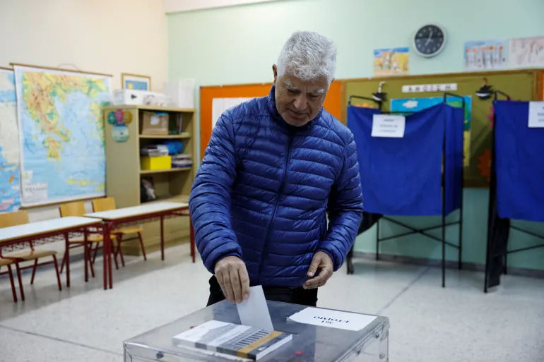 A man casting his vote