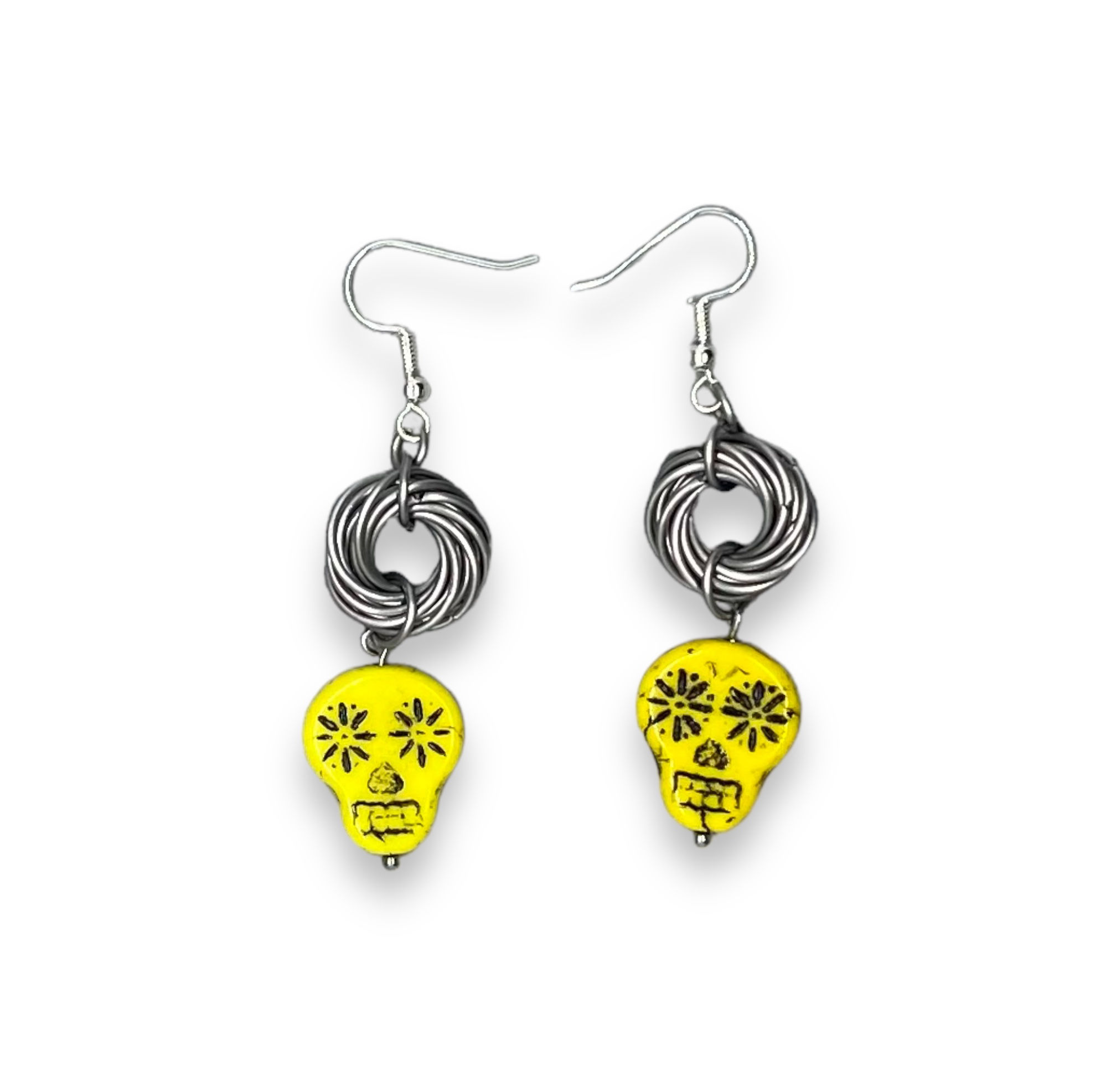 Skull dangle earrings, silver and yellow 