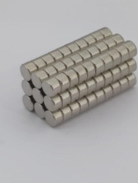 Thirty round magnets neatly stacked