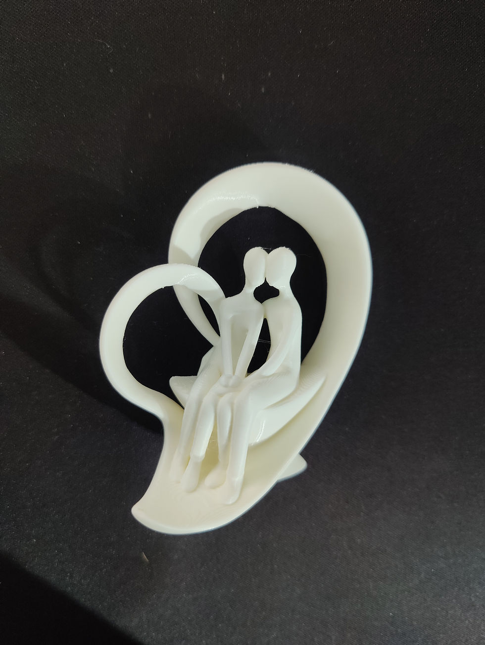 Thumbnail: 3D-printed couple figurine, heart-shaped base