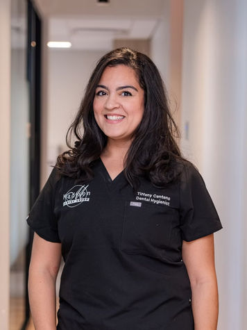 Portrait of Tiffany, Dental Hygienist at Madison Dental Group, providing preventive dental care.