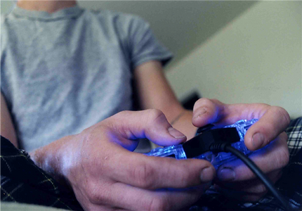 Person playing a video game_edited.png