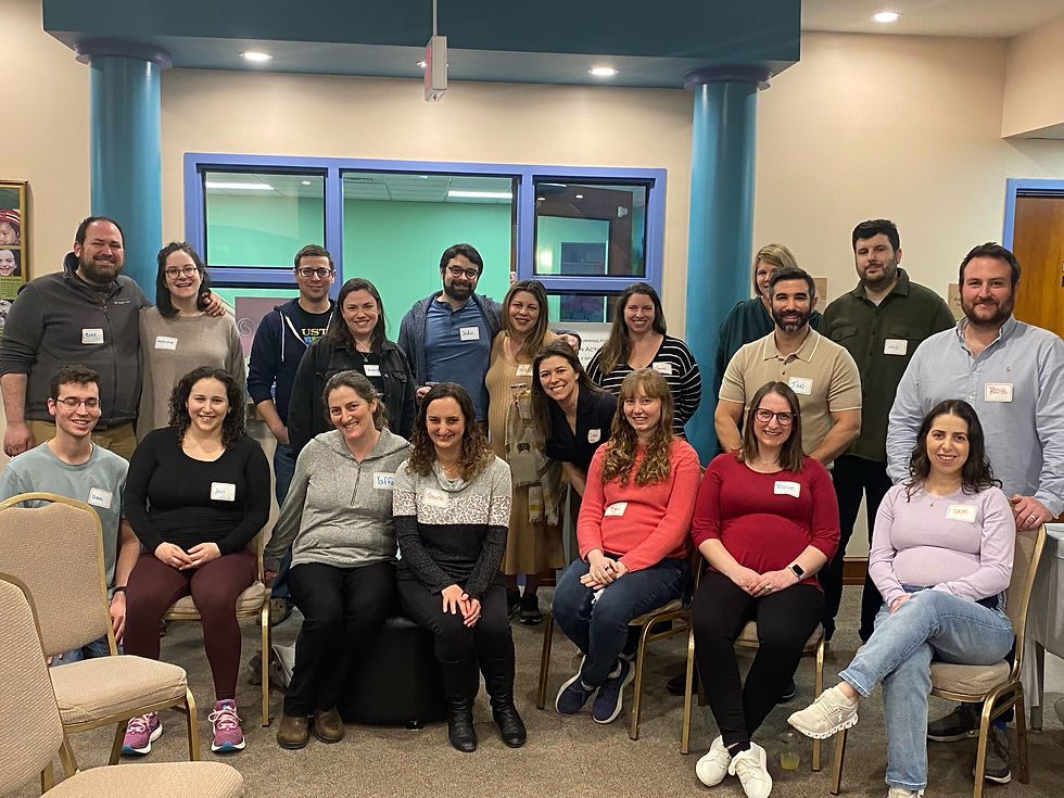 Close-up view of a childbirth educator demonstrating breathing techniques