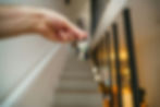 person holding keys to a new home | urbandogrealestate.com
