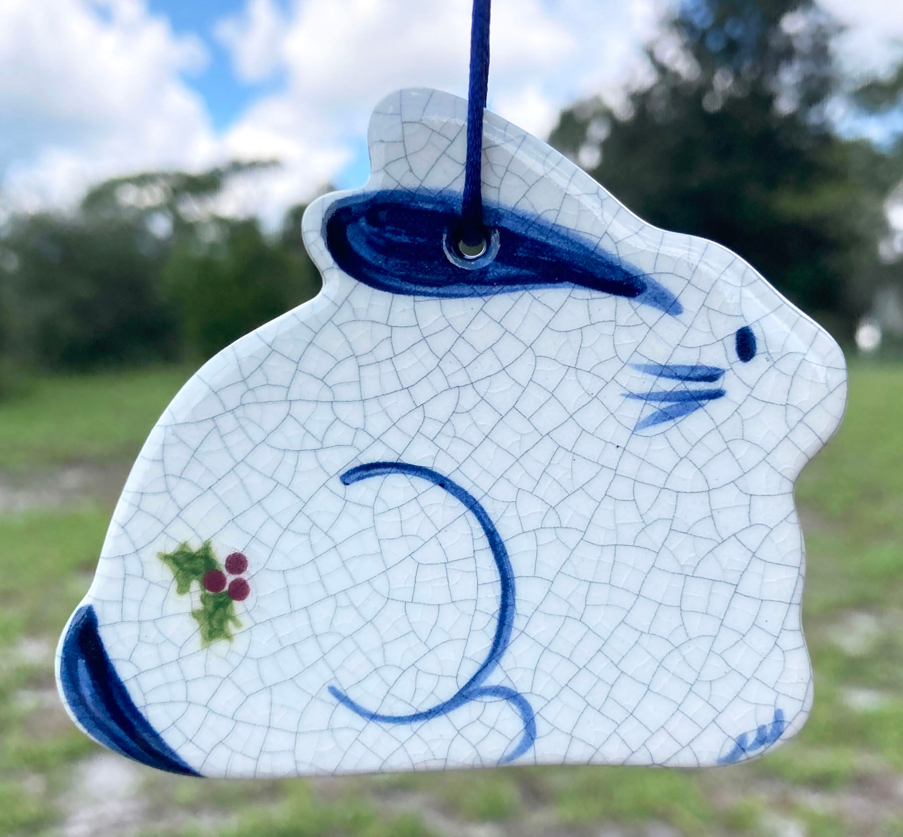 Brick Pond porcelain sitting bunny ornament with blue and white glaze