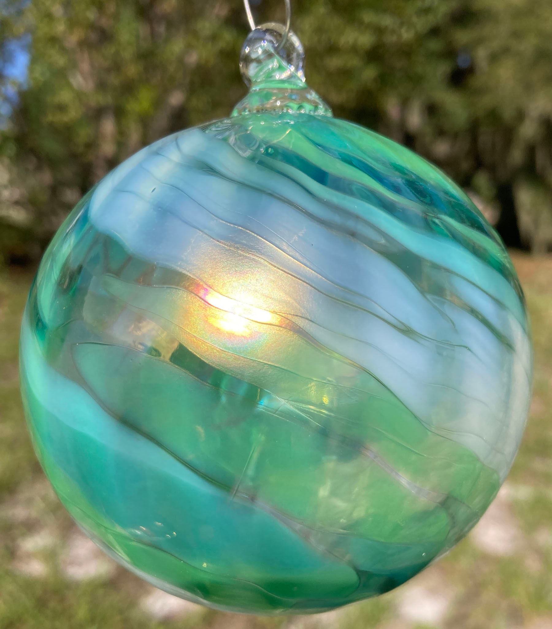 Tom Stoenner Glass ornament in green