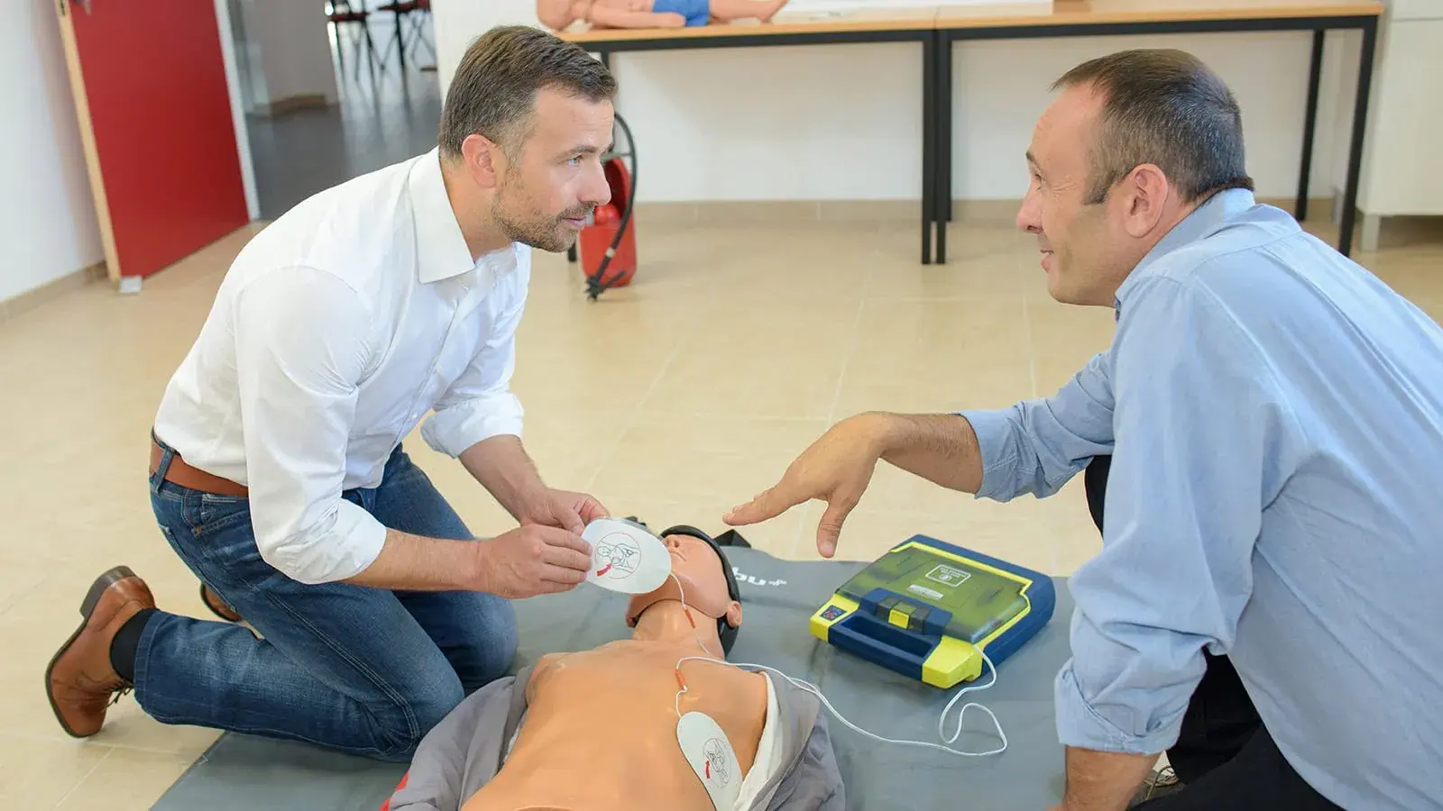 Teaching CPR to adult male