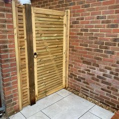 tall wooden gate.jpeg