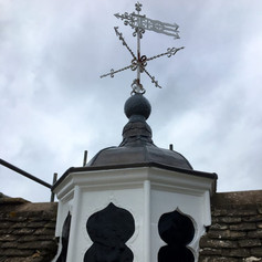 weather vane on a roof.jfif