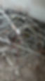 A scrap of tangled pile of various coloured cables and wires