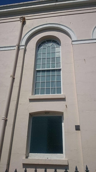 house with arched casement window