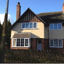 House with finished rendering